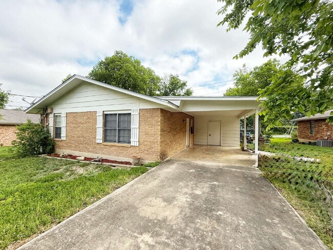 Building Photo - Prime Location! Fresh Paint – Charming 2BR...