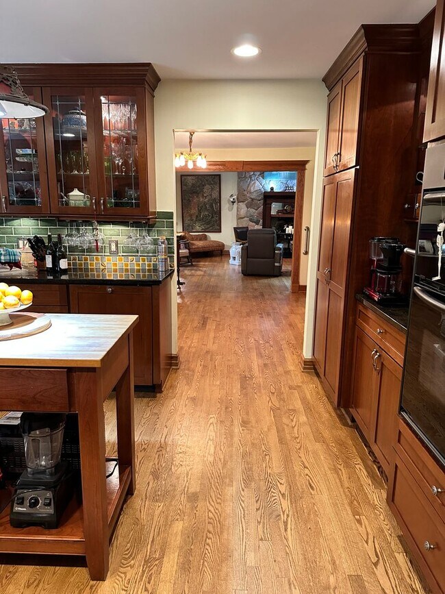 Building Photo - Dream Home in Highland, Michigan: Your Private Oasis on 5 Wooded Acres