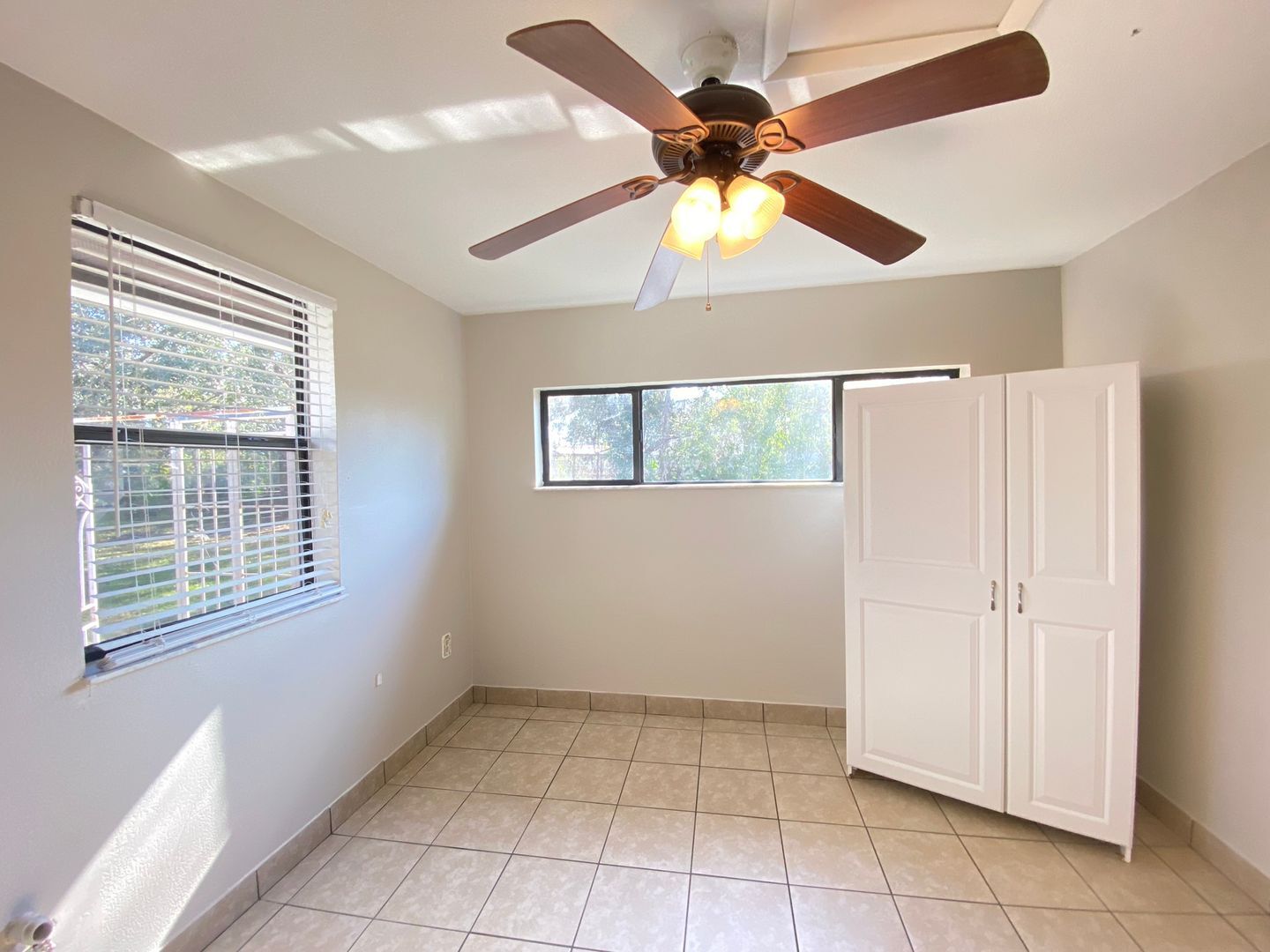 Building Photo - 2/2 home with garage - tile on inside with...