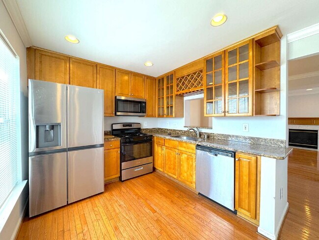 Building Photo - Inviting Suburban Retreat with Spacious Layout and Timeless Hardwood Flooring