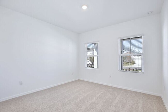 Building Photo - Stylish Sunbrooke Sanctuary! Modern 4/2 Ho...