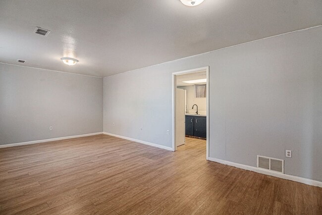 Building Photo - 7360 W.20th Ave. Unit B