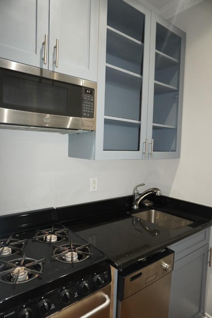 Building Photo - 697 Tenth Ave (47th & 48th Ave), #2FS
