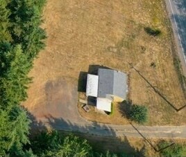 Aerial view of house and yard - 2058 Long Lake Rd SE
