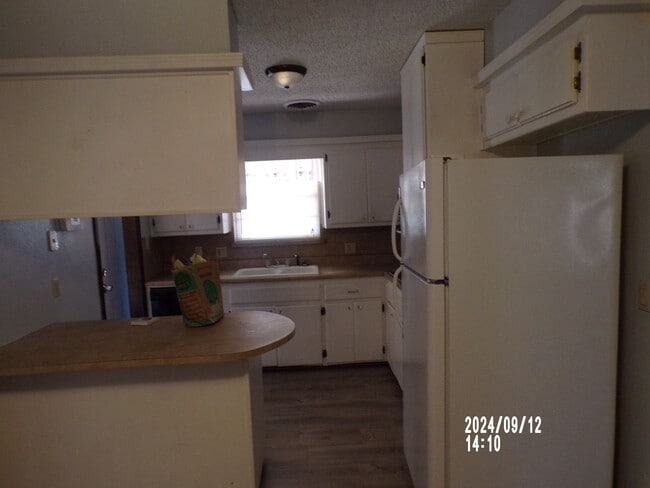 Building Photo - Pets negotiable with owner approval