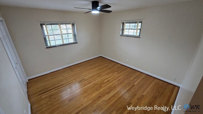 Building Photo - Charming Mid-Century 2BR Home with Sunroom, Fireplace & Fenced Yard