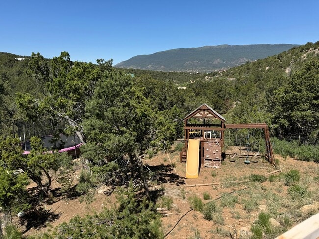 Building Photo - 4 Bedroom, 3 Bathroom Home in Tijeras, NM