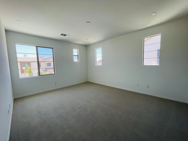 Building Photo - Located in the highly sought-after master-planned community of The Preserve at Chino, this modern...