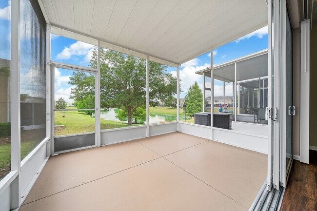 Building Photo - Corner Unit ~ Lake View ~ Maintenance Free...
