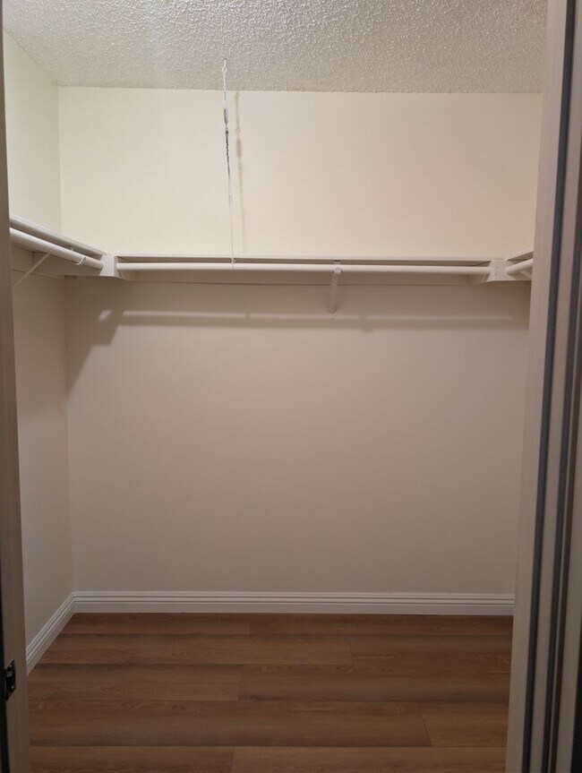 Building Photo - Rare opportunity to lease a 4-bedroom home featuring oversized bedrooms, scenic hilltop city view...