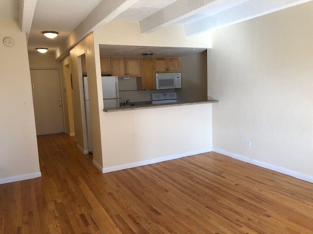 Kitchen with pass through to living space - 200 Pearl St