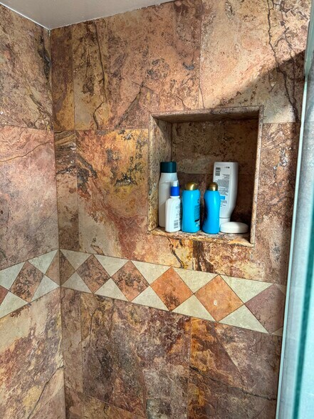 Primary shower cubby - 2700 Cahuenga Blvd E