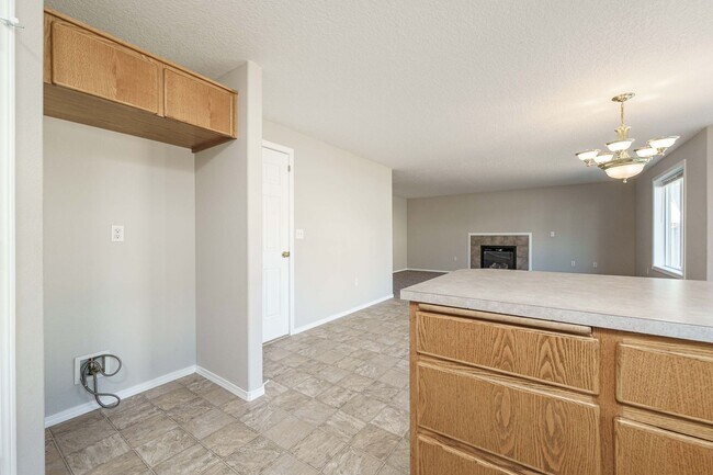 Building Photo - Your Next Home Awaits! 4BR/2.5BA with Fenc...