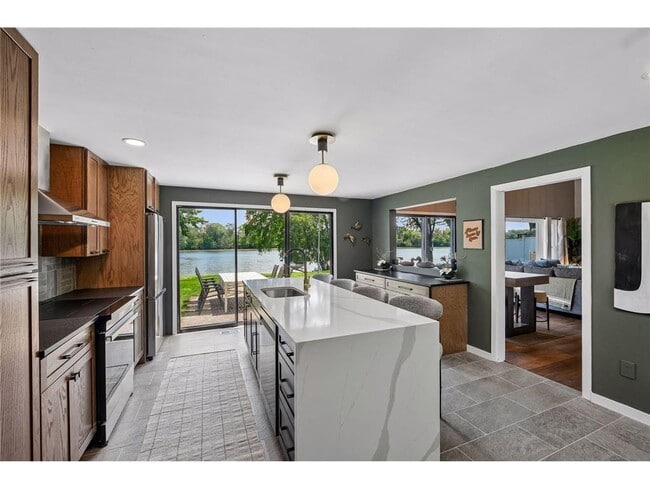Building Photo - 5636 Twin Lake Terrace N