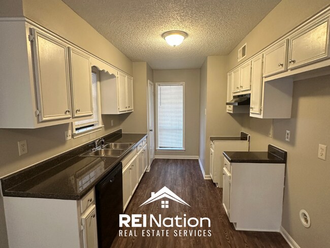 Building Photo - NEWLY RENOVATED! Massive 4BR/2BA Bartlett Stunner | Hardwoods & Fireplace!