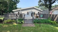 Building Photo - Riverfront Living on the Fox: 2 Bed, 1 Bath with Private Dock and Oversized Garage