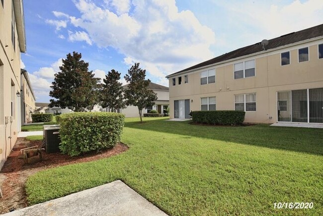 Building Photo - Beautiful 3/3.5 Townhome with a Spacious 2 Car Garage in the Gate Guarded Community of Spring Isl...