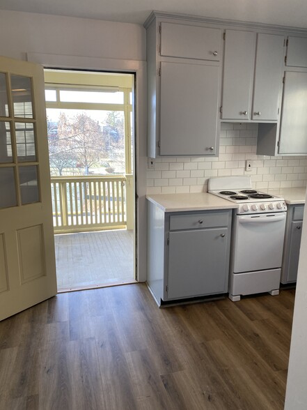 In kitchen looking out at porch - 138 Willis St