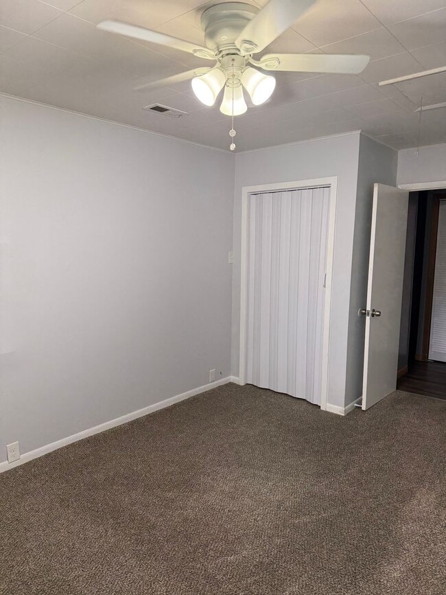 Building Photo - 3BR/1BA with overside detached garage read...