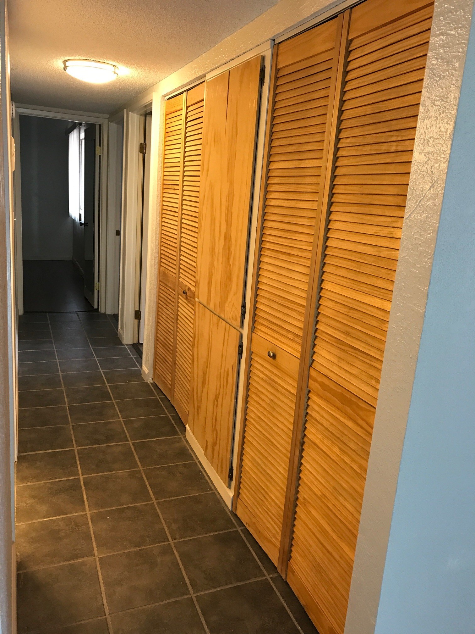 Hallway to bedrooms - 824 S Langley Ave