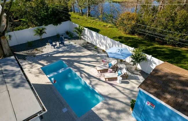 Building Photo - Utilities Included - (DECEMBER ONLY) Furnished 3-Bedroom Home with Private Heated Pool, Spa & More!