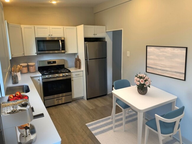 Primary Photo - 4 Bedroom and 1.5 Bath House with In-Unit ...
