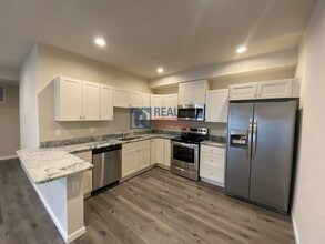 Building Photo - 875 E 78th Ave