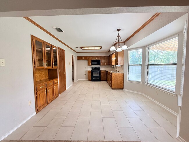 Building Photo - 8041 Miles Dr
