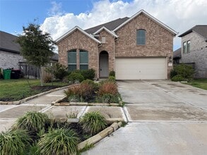 Building Photo - 8711 Windsong Trail Dr