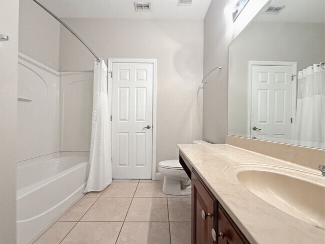 Building Photo - Waterfront 4 Bedroom Home in Eagle Creek Golf Community – Lake Nona