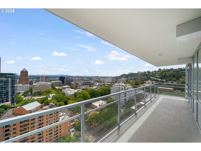Building Photo - Modern 2-Bed/2-Bath Condo with Balcony & Prime Downtown Location