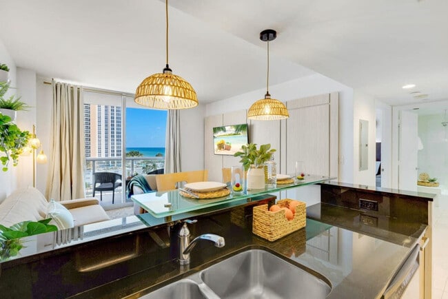Building Photo - 18683 Collins Ave