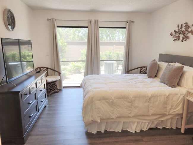 Building Photo - Bird Bay Village Annual Rental – Furnished 1st Floor Unit with Covered Parking