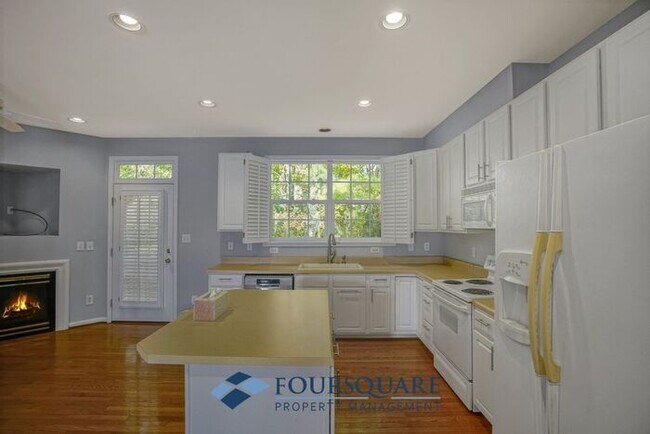 Building Photo - Lakefront Townhome with 1st Floor Bedroom, Fireplace & 2-Car Garage – In Raleigh