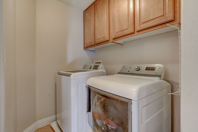 Building Photo - Pool Home with Downstairs Primary Bedroom!