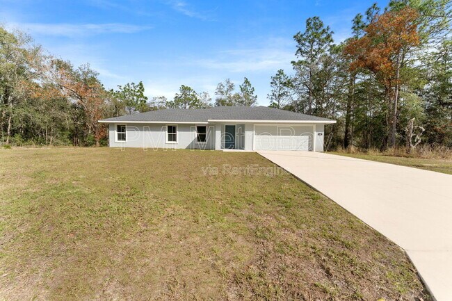 Building Photo - 9461 N Sandree Dr