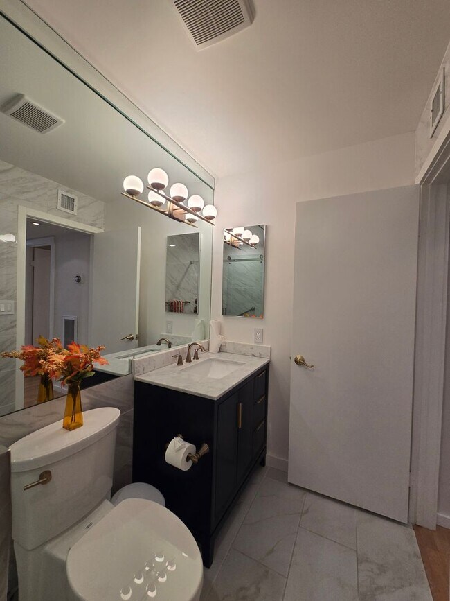 Building Photo - Furnished, 1-Year Long-Term Rental