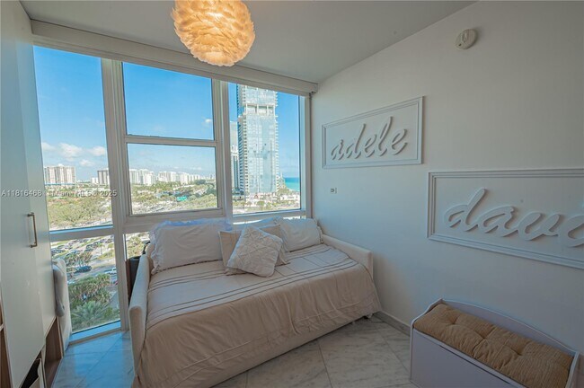Building Photo - 18201 Collins Ave