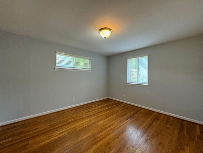 Building Photo - Sought-After 4 Bed 3 Bath L-Shaped Rambler...