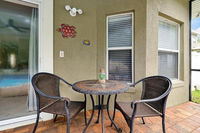 Building Photo - "Stunning 3BR Orlando Home with Private Screened Pool, Spa & Spacious Living Areas"