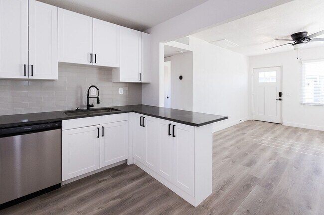 Building Photo - Boutique Living Meets Private Backyards and a Lush, Landscaped Courtyard Oasis at Turney Flats