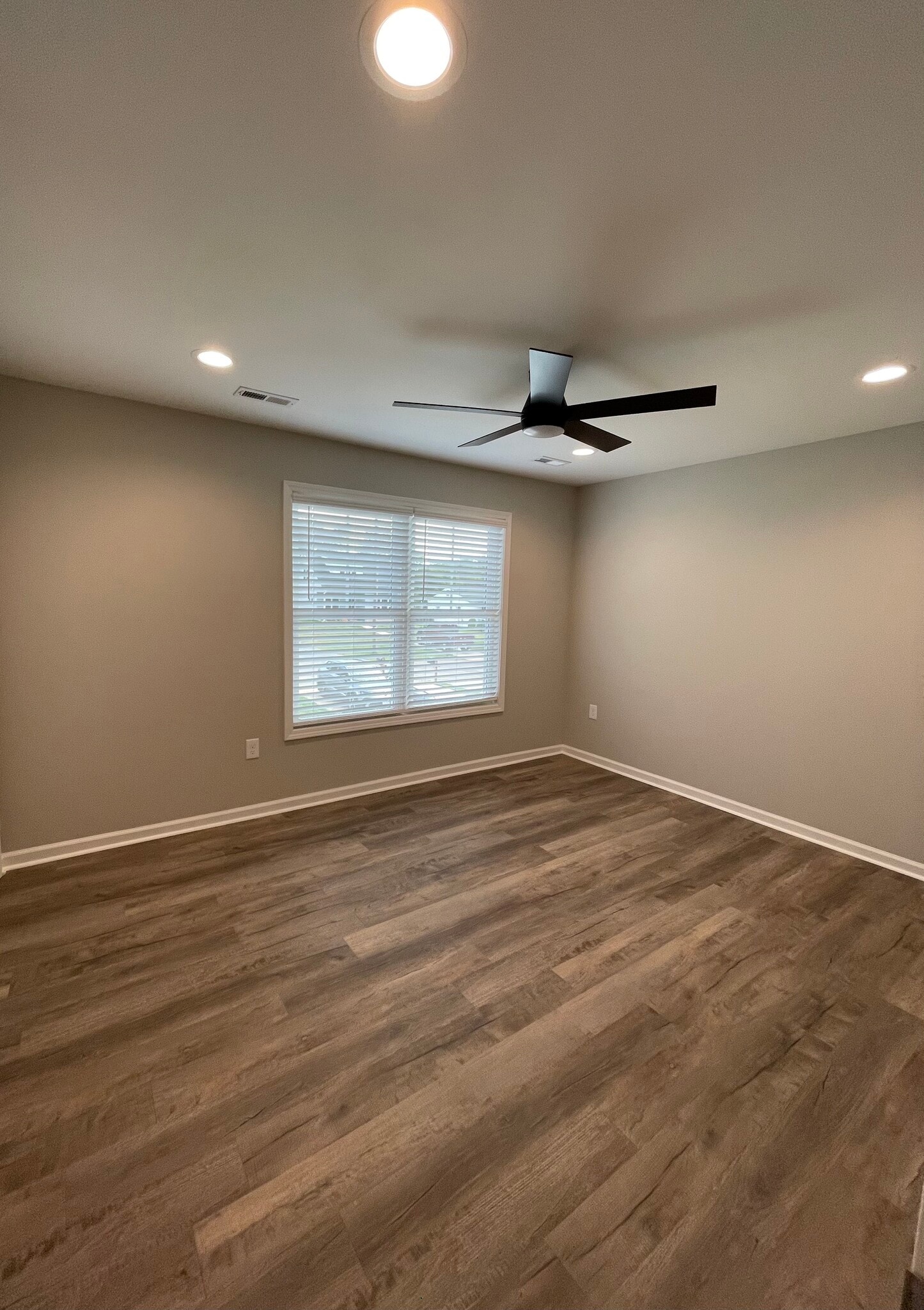 Second bedroom, double window, ceiling fan, recessed dimmable lighting - 2225 Kenwood Blvd SE