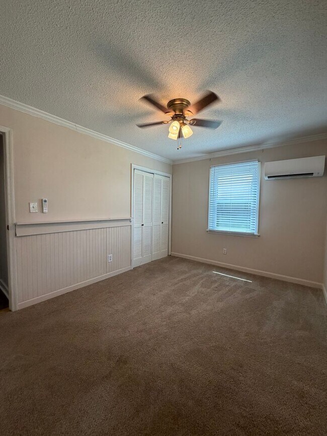 Building Photo - Charming 2-Bedroom Home with an Enclosed Sunroom & Peaceful Outdoor Living