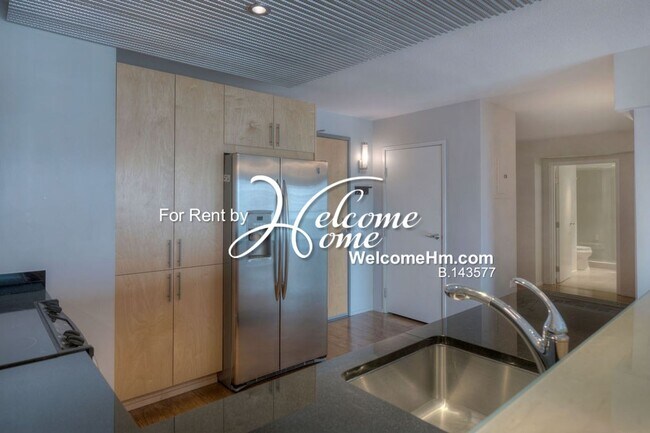 Building Photo - Coming Soon - Downtown High-rise Montage A...