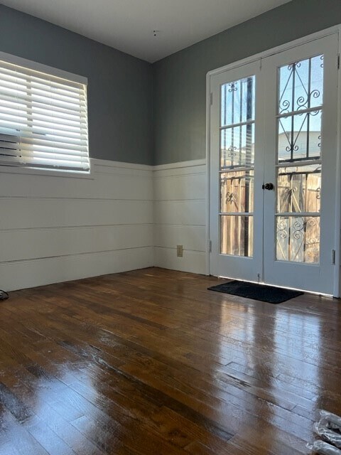 Bedroom 1 or home office w/ French doors leading to rear private patio - 536 Cypress Ave
