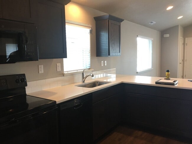 Building Photo - Cozy 2BR Home with Covered Patio & Animal-Friendly Yard – Utilities Included!