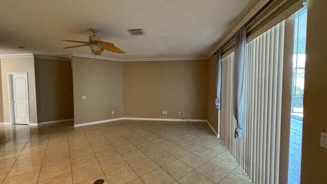 Building Photo - Spacious 4/3.5 Pool Home with Water View & 3-Car Garage in Lee Vista Area (close to Lake Nona)