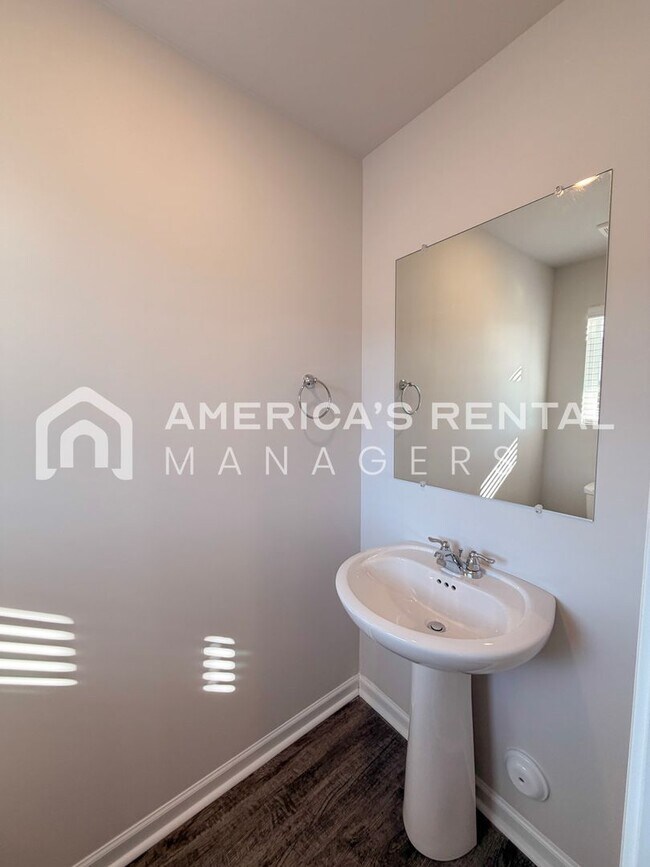 Building Photo - Spacious Two-Story Townhome with Open Layout!