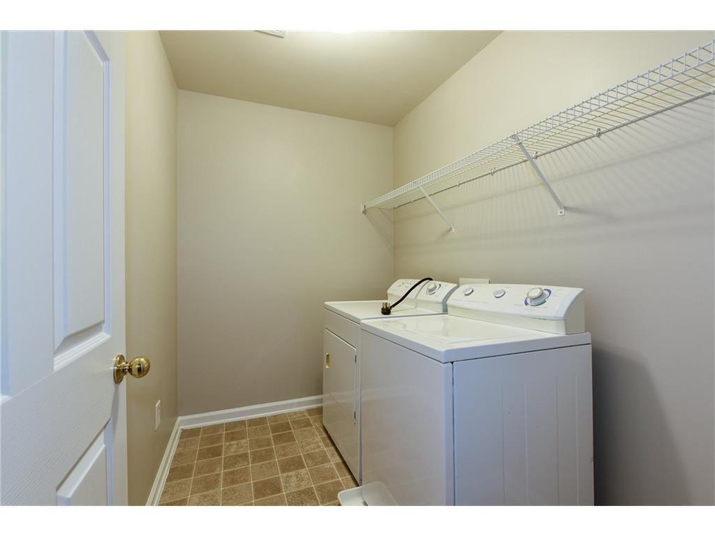 Laundry room. Washer and Dryer are not included - 428 Tioram Ln SE
