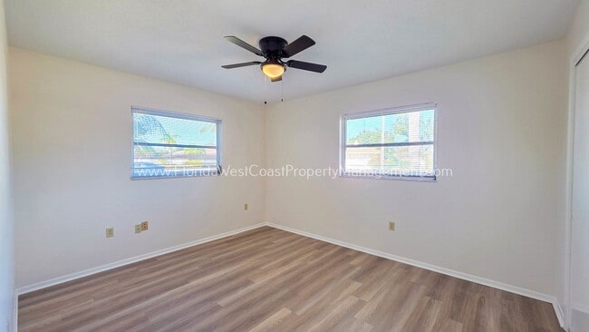Building Photo - SPACIOUS SARASOTA HOME WITH LARGE FENCED YARD! MOVE IN READY! ALL TILE/ NEW LVP!